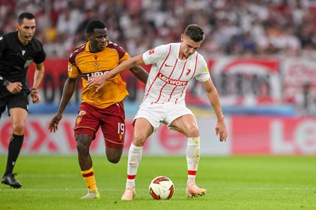 Ibrahim Said of Motherwell FC and Yannik Engelhardt of SC Freiburg battle for the ball during the second leg of the 2026-27 UEFA Conference League Playoff Round match between SC Freiburg and Motherwell at Stadion am Wolfswinkel on August 27, 2026 in Freiburg, Germany. Photo by Harry Langer, DeFodi Images