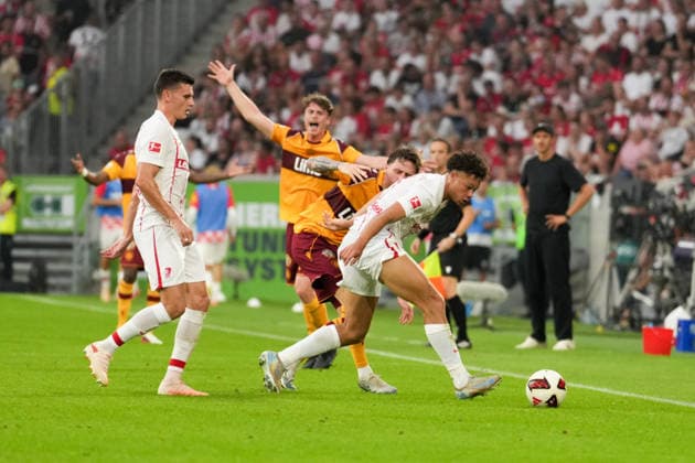 UEFA Conference League Qualifier: SC Freiburg vs. FC Motherwell, August 27, 2026: Head-to-head matchup between Derry Scherhant (SC Freiburg, No. 7) and Alex Lowry (FC Motherwell, No. 11) in the UEFA Conference League Qualifier: SC Freiburg vs. FC Motherwell at Europa-Park Stadium on August 27, 2026 Copyright: xBEAUTIFULxSPORTS Boscox
