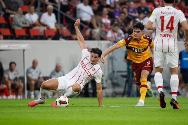 Igor Matanovic of SC Freiburg, 31, and Jamie Knight Lebel of Motherwell FC, 04, battling for the ball; Germany, soccer, UEFA Conference League, playoffs, 2026–2027, SC Freiburg vs. Motherwell FC, August 27, 2026, Freiburg im Breisgau, Europa-Park Stadium, Germany Copyright: xGrantxHubbsx