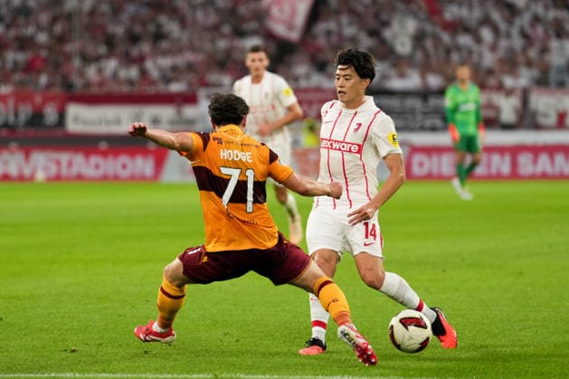 UEFA Conference League Qualifier: SC Freiburg vs. FC Motherwell, August 27, 2026: A duel between Joe Hodge (FC Motherwell, No. 71) and Yuito Suzuki (SC Freiburg, No. 14) in the UEFA Conference League Qualifier: SC Freiburg vs. FC Motherwell at Europa-Park Stadium, August 27, 2026 Copyright: xBEAUTIFULxSPORTS Boscox