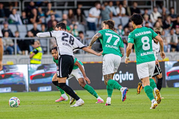 UEFA Europa League play-offs, 2nd leg – Kauno Žalgiris vs Besiktas at Dariaus ir Gireno Stadium, Kaunas, Lithuania. Duöan Vlahovic challenges Rokas Lekiatas during the UEFA Europa League play-offs second leg match between Kauno Žalgiris and Besiktas at Dariaus ir Gireno Stadium in Kaunas, Lithuania. Kaunas Kaunas Lithuania