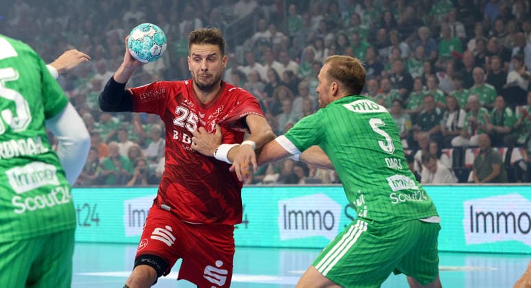 Olle Forsell Schefvert with the ball, Max Darj in a tackle; game scene, action, sports, handball, HBL Bundesliga Men s Division 1, Matchday 1, 2026–2027 season, August 27, 2026, Füchse Berlin vs. MT Melsungen