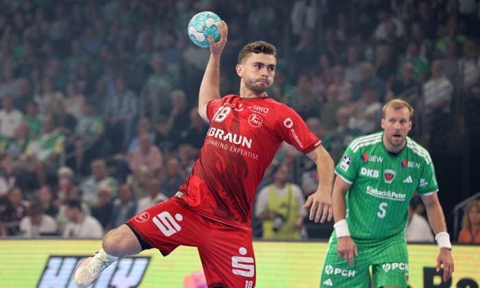 Florian Drosten with the ball, Max Darj in action; upper body; sports; handball; HBL Bundesliga Men s Division 1; Match Day; 2026-2027 season; August 27, 2026; Füchse Berlin vs. MT Melsungen