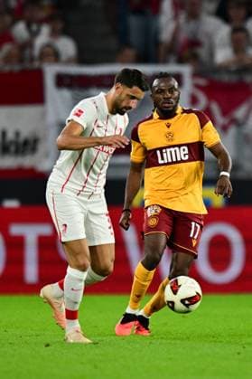 Vincenzo Grifo of SC Freiburg and Regan Charles-Cook of Motherwell Freiburg v Motherwell, UEFA Conference League, Play-Off Round, Second Leg, Football, Europa-Park-Stadion, Freiburg, Germany - 27 Aug 2026Freiburg Europa-Park-Stadion Germany  Copyright: xMaxxKrause Shutterstockx 17118930ct