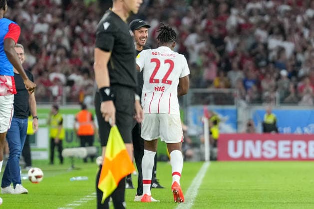 Julian Schuster, SC Freiburg, Coach, and Cyriaque Irie, SC Freiburg, 22 goal celebrations, emotions, shot on goal, finish, goal scored, goal, hit, Germany, soccer, UEFA Conference League, Playoffs, Second Leg, 2026–2027, SC Freiburg vs. Motherwell FC, August 27, 2026, Europa-Park Stadium, Freiburg, Freiburg, Europa-Park Stadium, Baden-Württemberg, Germany Copyright: xArnexAmbergx