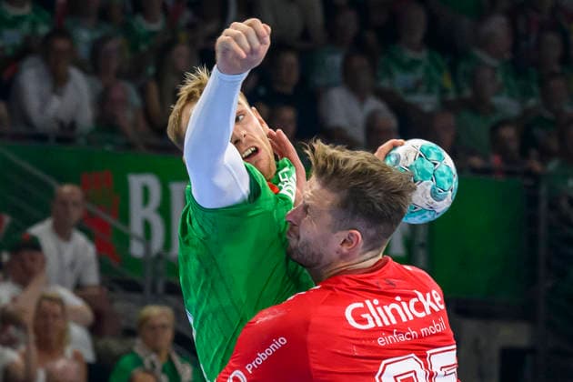 Pictured, from left: Mathias Gidsel of Füchse Berlin, 19, in a one-on-one battle, GER, Berlin, handball, Füchse Berlin vs. MT Melsungen, at the Max Schmeling Halle, August 27, 2026, Copyright: HMBxMedia UwexKoch