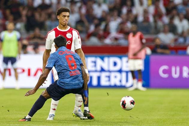 AMSTERDAM , 27-08-2026 , JohanCruijff ArenA , season 2026 2027 , UEFA Conference League play-off football . Match between Ajax and FC Sion, Picture shows Ajax player Aaron Bouwman and FC Sion player Batata Ajax - Sion  x206095414x Copyright: