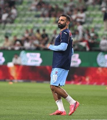 Ahead of Ferencvaros v Trabzonspor - UEFA Europa League BUDAPEST, HUNGARY - AUGUST 27: Mohamed Salah of Trabzonspor warms up ahead of the UEFA Europa League play-off second-leg match between Ferencvaros and Trabzonspor at Groupama Stadium in Budapest, Hungary on August 27, 2026. Hakan Burak Altunoz Anadolu Budapest Hungary. Editorial use only. Please get in touch for any other usage.  Copyright: x2026xAnadoluxHakanxBurakxAltunozx