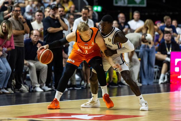 August 27, 2026, GER, FIBA 2027 Basketball World Cup, European Qualifiers, Cologne, Germany vs. Turkey, Keye van der Vuurst (Netherlands), 1, in a one-on-one matchup against Dennis Schroeder (Germany), 17, Cologne, LANXESS Arena, North Rhine-Westphalia, Germany