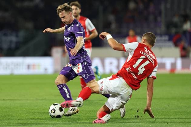 27.August.2026 - SOCCER - 2026 27 UEFA Conference League Play-offs, 2nd Leg, FK Austria Wien vs Sporting Braga Johannes Eggestein (Austria Wien) and Gustaf Lagerbielke (SC Braga) in duel Vienna Franz-Horr-Stadion (Generali-Arena) Vienna Austria Copyright: xYigitxOermex xPsxImagesxYigitxOermex xPsxImagesx