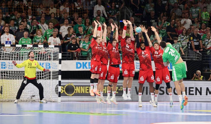 Left: Goalkeeper Kristof Palasics; Right: Lauro Pichiri throws the ball at the wall. Head-to-head duel. Game scene. Action. Sports. Handball. HBL Bundesliga. Men s Division 1. Matchday. 2026–2027 season. August 27, 2026. Füchse Berlin vs. MT Melsungen