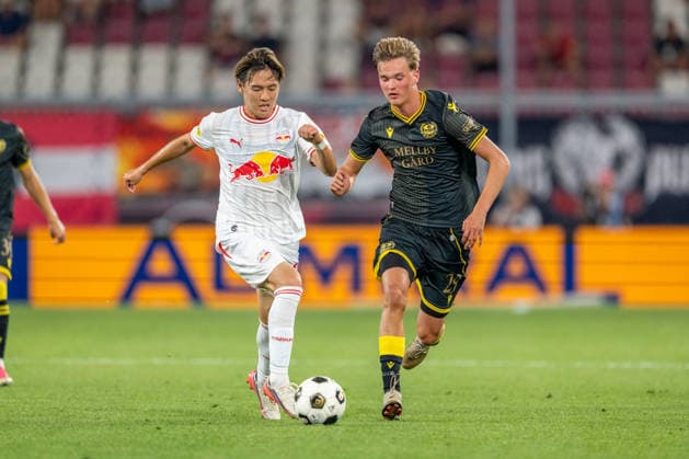 SOCCER - UEFA EL, RBS vs Mjaellby SALZBURG,AUSTRIA,27.AUG.26 - SOCCER - UEFA Europa League, play-off, Red Bull Salzburg vs Mjaellby AIF. Image shows Sota Kitano (RBS) and Olle Lindberg (Mjaellby).  GEPAxpictures xWolfgangxKofler