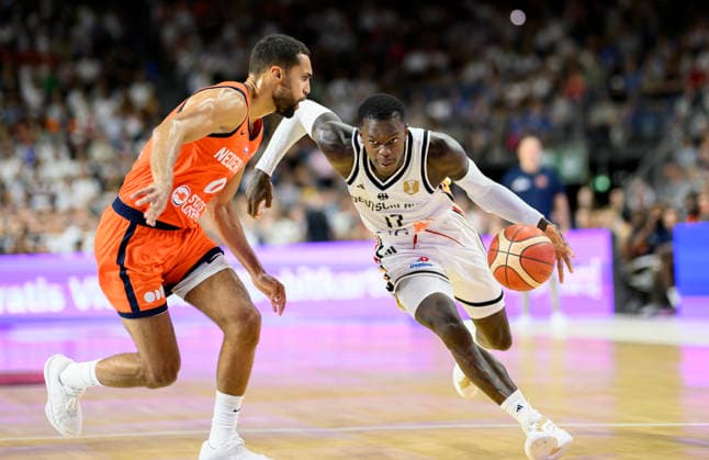 Dennis Schröder of Germany in action against Yannik Franke of the Netherlands; men s basketball FIBA World Cup qualifying game, Second Round Group K, Germany vs. the Netherlands, on August 27, 2026, at the LanxessArena in Cologne, Germany