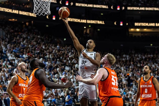 August 27, 2026, GER, FIBA 2027 Basketball World Cup, European Qualifiers, Cologne, Germany vs. Turkey, Johannes Thiemann (Germany, No. 32) in a one-on-one matchup against Rienk Mast (Netherlands, No. 51), Cologne, LANXESS Arena, North Rhine-Westphalia, Germany