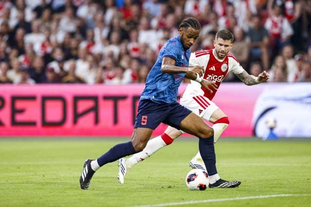 AMSTERDAM , 27-08-2026 , JohanCruijff ArenA , season 2026 2027 , UEFA Conference League play-off football . Match between Ajax and FC Sion, Picture shows FC Sion player Noe Abdou Sow and Ajax player Caio Henrique Ajax - Sion  x206096576x Copyright: