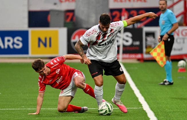 UEFA Europa Conference League Play-off Second Leg, Inver Park, Antrim 27 8 2026 Larne vs Lincoln Red Imps Larne™s Matty Lusty with Imp™s Bernardo Lopes Matty Lusty with Bernardo Lopes 27 8 2026  Copyright: xx Larne v Imps-010