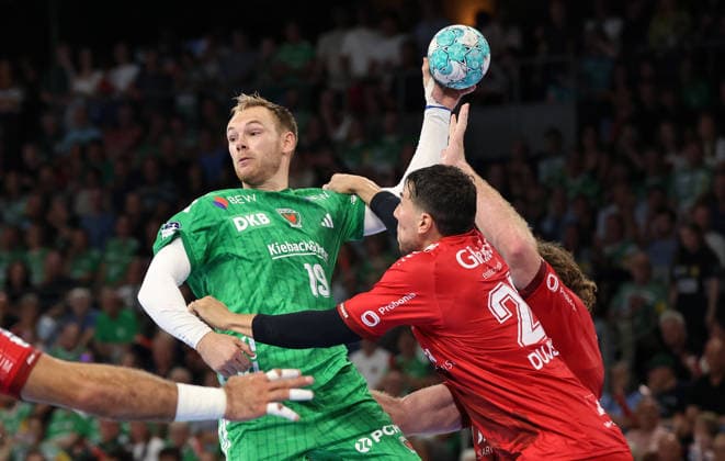Mathias Gidsel with the ball, Daniel Dujshebaev, Johannes Golla, a duel, game action, sports, handball, HBL Bundesliga Men s Division 1, Matchday, 2026–2027 season, August 27, 2026, Füchse Berlin vs. MT Melsungen