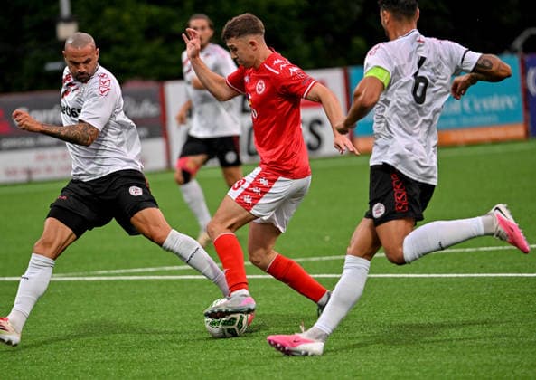 UEFA Europa Conference League Play-off Second Leg, Inver Park, Antrim 27 8 2026 Larne vs Lincoln Red Imps Larne™s Paul O Neill with Imp™s Mariano Gonzalez Maroto Paul O Neill with Mariano Gonzalez Maroto 27 8 2026  Copyright: xx Larne v Imps-011
