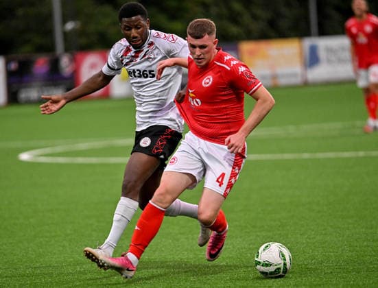 UEFA Europa Conference League Play-off Second Leg, Inver Park, Antrim 27 8 2026 Larne vs Lincoln Red Imps Larne™s Aaron Donnelly with Imp™s Aly Coulibaly Aaron Donnelly with Aly Coulibaly 27 8 2026  Copyright: xx Larne v Imps-014