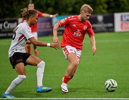 UEFA Europa Conference League Play-off Second Leg, Inver Park, Antrim 27 8 2026 Larne vs Lincoln Red Imps Larne™s Dylan Sloan with Imp™s Juliana Eerstelling Dylan Sloan with Juliana Eerstelling 27 8 2026  Copyright: xx Larne v Imps-015