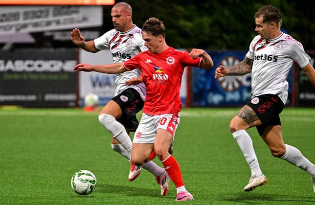 UEFA Europa Conference League Play-off Second Leg, Inver Park, Antrim 27 8 2026 Larne vs Lincoln Red Imps Larne™s Matty Lusty with Imp™s Mariano Gonzalez Maroto Matty Lusty with Mariano Gonzalez Maroto 27 8 2026  Copyright: xx Larne v Imps-020