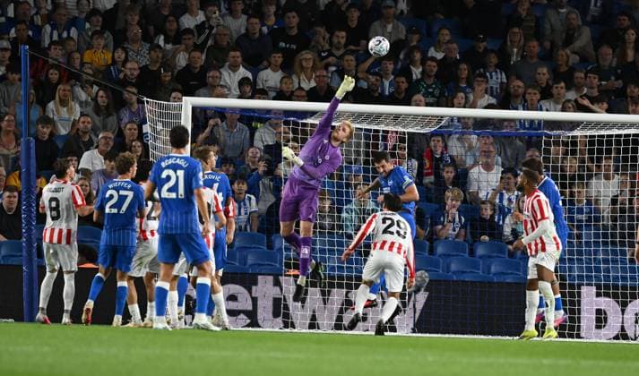 Jakob Haugaard of Tromso makes a save during the Europa Conference League Qualifying match between Brighton and Hove Albion and Tromso at the American Express Stadium, Brighton UK - Thursday 27th August 2026 Brighton v Tromso Europa Conference League 2026, Amex Stadium, Sussex, UK - 27 Aug 2026Brighton Amex Stadium Sussex United Kingdom Editorial use only. No merchandising. For Football images FA and Premier League restrictions apply inc. no internet mobile usage without FAPL license - for details contact Football Dataco  Copyright: xLizxFinlayson TPI Shutterstockx 17121964be