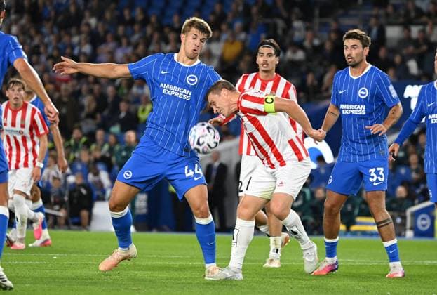 Luka Vuskovic of Brighton and Ruben Yttergard Jennsen of Tromso battle for the ball during the Europa Conference League Qualifying match between Brighton and Hove Albion and Tromso at the American Express Stadium, Brighton UK - Thursday 27th August 2026 Brighton v Tromso Europa Conference League 2026, Amex Stadium, Sussex, UK - 27 Aug 2026Brighton Amex Stadium Sussex United Kingdom Editorial use only. No merchandising. For Football images FA and Premier League restrictions apply inc. no internet mobile usage without FAPL license - for details contact Football Dataco  Copyright: xLizxFinlayson TPI Shutterstockx 17121964bf