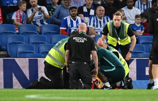 Vetie Skjoervik of Tromso gets treatment before going off injured on a stretcher during the Europa Conference League Qualifying match between Brighton and Hove Albion and Tromso at the American Express Stadium, Brighton UK - Thursday 27th August 2026 Brighton v Tromso Europa Conference League 2026, Amex Stadium, Sussex, UK - 27 Aug 2026Brighton Amex Stadium Sussex United Kingdom Editorial use only. No merchandising. For Football images FA and Premier League restrictions apply inc. no internet mobile usage without FAPL license - for details contact Football Dataco  Copyright: xLizxFinlayson TPI Shutterstockx 17121964at