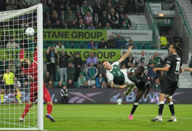 Jason Kerr of Hibernian beats Mouhamed El Ngom of KAA Gent in the air and scores with a header to tie the game 1-1 (Agg. 1-1). Hibernian v Gent, UEFA Conference League, Play-Off Round, Second Leg, Football, Easter Road, Edinburgh, Scotland, UK - 27 Aug 2026Edinburgh Easter Road United Kingdom  Copyright: xStuartxWallace Shutterstockx 17118942bd