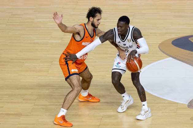 Dennis SCHROEDER SCHRÖDER GER, 17, right, battles for the ball against Troy KOEHLER NED, 16, left, in action; international basketball game, World Cup qualifier, Germany (GER) vs. the Netherlands (NED), final score 99–83, FIBA Basketball World Cup European Qualifiers, 2nd Round, Group K, on August 27, 2026, at the Lanxess Arena in Cologne Â