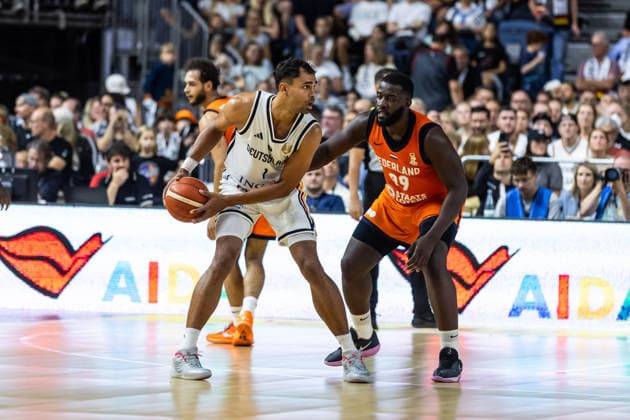 August 27, 2026, GER, FIBA 2027 Basketball World Cup, European Qualifiers, Cologne, Germany vs. Turkey, Oscar Da Silva (Germany), 1, Nathan Kuta (Netherlands), 99, Cologne, LANXESS Arena, North Rhine-Westphalia, Germany