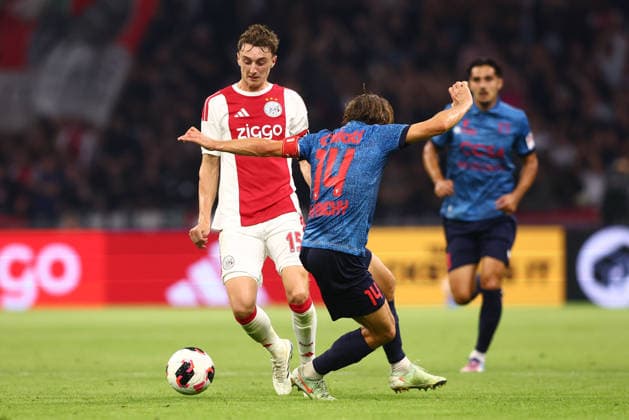 AMSTERDAM, NETHERLANDS - AUGUST 27: Youri Baas of Ajax, Numa Lavanchy of FC Sion during the UEFA Conference League match between Ajax and FC Sion at Johan Cruijff Arena on August 27, 2026 in Amsterdam, Netherlands.  Copyright: xMTB MBxMediax