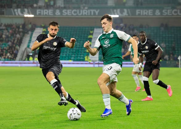 Hibernian v K.A.A. Gent UEFA Europa Conference League Abdelkahar Kadri of K.A.A. Gent and Adam Mayor of Hibernian competes for the ball during the UEFA Europa Conference League Play-Off Second Leg match at Easter Road, Edinburgh 27 08 2026 UK Newspapers OUT Copyright: xFredxPalmerx FIL-23844-0125