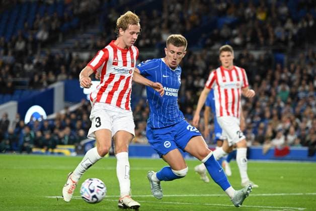 Mathias Tonnessen of Tromso shields the ball from Joao Costinha of Brighton during the Europa Conference League Qualifying match between Brighton and Hove Albion and Tromso at the American Express Stadium, Brighton UK - Thursday 27th August 2026 Brighton v Tromso Europa Conference League 2026, Amex Stadium, Sussex, UK - 27 Aug 2026Brighton Amex Stadium Sussex United Kingdom Editorial use only. No merchandising. For Football images FA and Premier League restrictions apply inc. no internet mobile usage without FAPL license - for details contact Football Dataco  Copyright: xLizxFinlayson TPI Shutterstockx 17121964ct