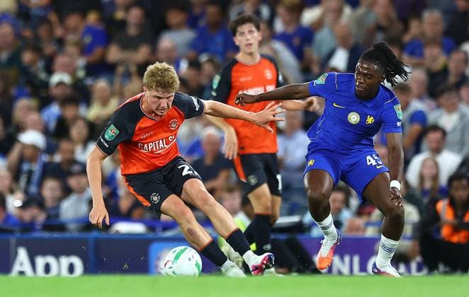Harry Fox of Luton Town and Romeo Lavia of Chelsea Chelsea v Luton Town, EFL Carabao Cup, Second Round, Football, Stamford Bridge, London, UK - 27 Aug 2026London Stamford Bridge United Kingdom EDITORIAL USE ONLY No use with unauthorised audio, video, data, fixture lists, club league logos or live services. Online in-match use limited to 120 images, no video emulation. No use in betting, games or single club league player publications.  Copyright: xMichaelxZemanek Shutterstockx 17118945dm
