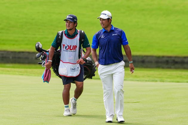 August 27, 2026, Atlanta, Georgia, USA: Hideki Matsuyama (JPN) (L) and his caddie approach the 11th green during the first round of the 2026 TOUR Championship at East Lake Golf Club. PGA, Golf Herren 2026: TOUR Championship - Round 1  - ZUMAw109 20260827_fap_w109_013 Copyright: xDebbyxWongx