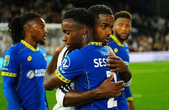 Ryan Sessegnon of Fulham hugs Steven Sessegnon of AFC Wimbledon Fulham v AFC Wimbledon, EFL Carabao Cup, Second Round, Football, Craven Cottage, London, UK - 27 Aug 2026London Craven Cottage United Kingdom EDITORIAL USE ONLY No use with unauthorised audio, video, data, fixture lists, club league logos or live services. Online in-match use limited to 120 images, no video emulation. No use in betting, games or single club league player publications.  Copyright: xJavierxGarcia Shutterstockx 17118946cq