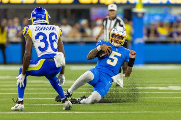 INGLEWOOD, CA - AUGUST 27: Trey Lance 5 of the Los Angeles Chargers slides for a first down during an NFL, American Football Herren, USA preseason game between the Los Angeles Rams and the Los Angeles Chargers on August 27, 2026, at SoFi Stadium in Inglewood, California. (Photo by Greg Fiore Icon Sportswire) NFL: AUG 27 Rams at Chargers EDITORIAL USE ONLY Icon2608271549