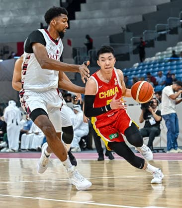 Qatar v China - FIBA Basketball World Cup 2027 Asian Qualifiers Liao Sanning (R) of China and Arfa Oussama Abdenacer (L) of Qatar in action during the second-round match between China and Qatar in the FIBA Basketball World Cup Asian Qualifiers at Al Janoub Stadium in Al Wakrah, Qatar, August 27, 2026. DOHA Qatar Copyright: xNOUSHADx