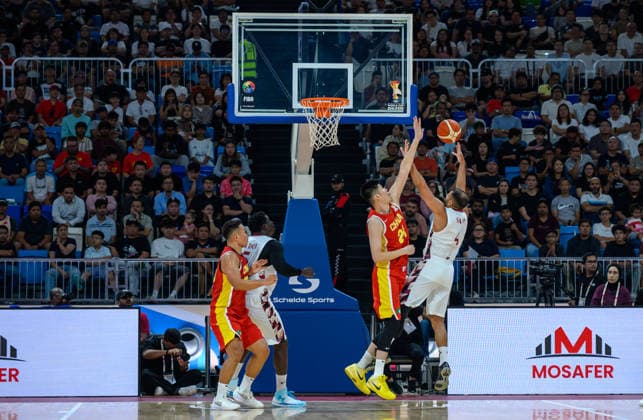 Qatar v China - FIBA Basketball World Cup 2027 Asian Qualifiers Hu Jinqiu (2-R) of China and Saad Abdulrahman Mohamed (R) of Qatar in action during the second-round match between China and Qatar in the FIBA Basketball World Cup Asian Qualifiers at Al Janoub Stadium in Al Wakrah, Qatar, August 27, 2026. DOHA Qatar Copyright: xNOUSHADx