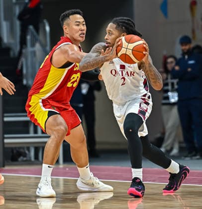 Qatar v China - FIBA Basketball World Cup 2027 Asian Qualifiers He Xining (L) of China and Lewis II Mike (R) of Qatar in action during the second-round match between China and Qatar in the FIBA Basketball World Cup Asian Qualifiers at Al Janoub Stadium in Al Wakrah, Qatar, August 27, 2026. DOHA Qatar Copyright: xNOUSHADx