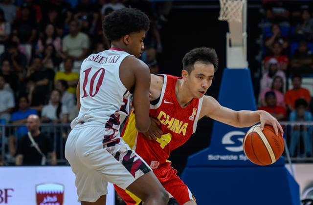 Qatar v China - FIBA Basketball World Cup 2027 Asian Qualifiers Zhao Jiwei (R) of China and Mousa Abdulla (L) of Qatar in action during the second-round match between China and Qatar in the FIBA Basketball World Cup Asian Qualifiers at Al Janoub Stadium in Al Wakrah, Qatar, August 27, 2026. DOHA Qatar Copyright: xNOUSHADx