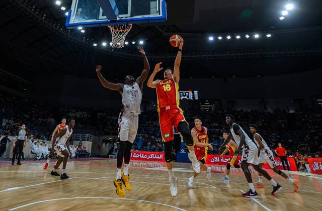 Qatar v China - FIBA Basketball World Cup 2027 Asian Qualifiers Jiao Boqiao (C) of China and Magassa Bobo (L) of Qatar in action during the second-round match between China and Qatar in the FIBA Basketball World Cup Asian Qualifiers at Al Janoub Stadium in Al Wakrah, Qatar, August 27, 2026. DOHA Qatar Copyright: xNOUSHADx