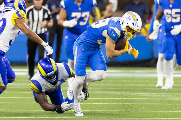 August 27, 2026, Inglewood, California, USA: Los Angeles Chargers Cornerback Eric Rogers (39) is tackled by Los Angeles Rams Inside Linebacker Nikhai Hill-Green (54) during an NFL, American Football Herren, USA football preseason game, in Inglewood, Calif. on Thursday August 27, 2026. Inglewood USA - ZUMAc68_ 20260827_zaf_c68_020 Copyright: xRingoxChiux