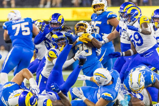 August 27, 2026, Inglewood, California, USA: Los Angeles Chargers Running Back Amar Johnson (35) runs the ball fighting off pressure from Los Angeles Rams during an NFL, American Football Herren, USA football preseason game, in Inglewood, Calif. on Thursday August 27, 2026. NHL, Eishockey Herren, USA 2026: LA Rams 20:18 LA Chargers  - ZUMAc68_ 20260827_zaf_c68_037 Copyright: xRingoxChiux