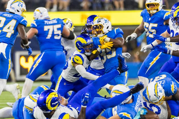 August 27, 2026, Inglewood, California, USA: Los Angeles Chargers Running Back Amar Johnson (35) runs the ball fighting off pressure from Los Angeles Rams during an NFL, American Football Herren, USA football preseason game, in Inglewood, Calif. on Thursday August 27, 2026. Inglewood USA - ZUMAc68_ 20260827_zaf_c68_043 Copyright: xRingoxChiux