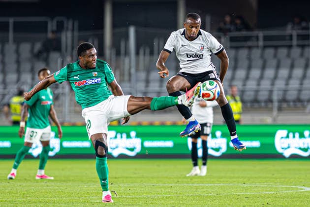 UEFA Europa League play-offs, 2nd leg – Kauno Žalgiris vs Besiktas at Dariaus ir Gireno Stadium, Kaunas, Lithuania. Renan Oliveira challenges Tiago Djalo during the UEFA Europa League play-offs second leg match between Kauno Zalgiris and Besiktas at Dariaus ir Gireno Stadium in Kaunas, Lithuania. Kaunas Kaunas Lithuania