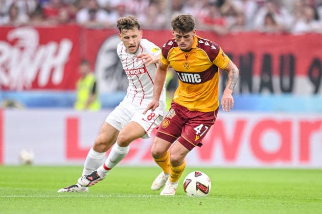 Maximilian Eggestein of SC Freiburg and Seb Palmer Houlden of Motherwell FC battle for the ball during the second leg of the 2026-27 UEFA Conference League Playoff Round match between Sport Club Freiburg and Motherwell at Stadion am Wolfswinkel on August 27, 2026 in Freiburg, Germany. Photo by Harry Langer, DeFodi Images