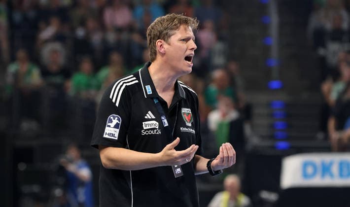 Coach Nicolej Krickau pointing and gesturing; upper-body action; handball; HBL Bundesliga Men s Division 1; Matchday; 2026–2027 season; August 27, 2026; Füchse Berlin vs. MT Melsungen