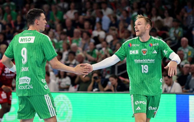 Frederik Simak high-fives Mathias Gidsel; Action; Upper Body; Sport; Handball; HBL Bundesliga; Men s 1; Matchday; 2026–2027 Season; August 27, 2026; Füchse Berlin vs. MT Melsungen